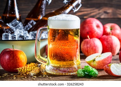 Cold And Fresh Cider Beer With Apples