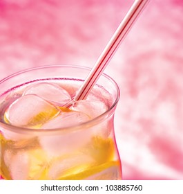 Cold Fresh With Ice Lemonade  On Pink Background