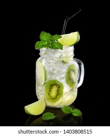 Cold Fruit  Lemonade In  Mason  Jar On A Black Background