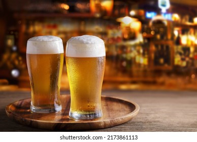 Cold glasses of beer in a bar