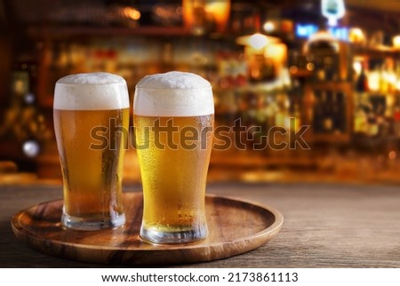 Cold glasses of beer in a bar