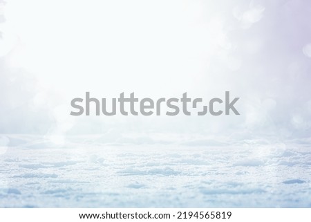 COLD ICE BACKGROUND WITH LIGHT HAZE, NATURAL CHRISTMAS BACKDROP BACKGROUNDS WITH EMPTY SPACE FOR MONTAGE PRODUCTS OR CHRISTMAS PRESENTS, FROSTY WINTER LANDSCAPE
