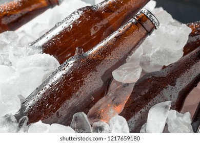 Cold Icy Beer Bottles In A Cooler With Ice