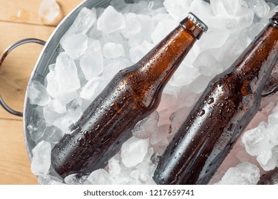 Cold Icy Beer Bottles In A Cooler With Ice