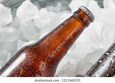 Cold Icy Beer Bottles In A Cooler With Ice