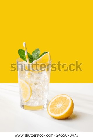 Similar – Image, Stock Photo Healthy drink concept with water glass, herbs and orange slices on light table. Front view