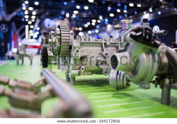 cold machinery\
set against green background\
4