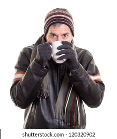 Cold Man Drinking Hot Beverage To Stay Warm