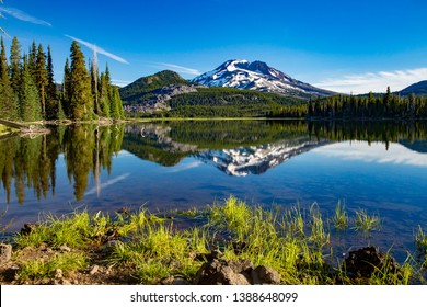 a cold morning on sparks lake with the south sister mountain in the background, near Bend, Oregon