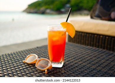 Cold Orange Mocktail On Table With Sea View