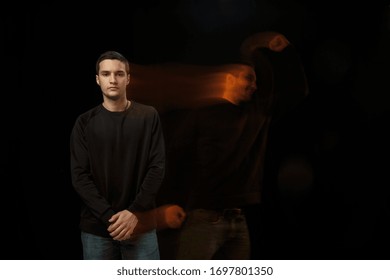Cold outside, celebrating inside. The versatility of man - opened emotions and hidden feelings. Caucasian man on black background with different faces of condition. Double exposure. Mental health.
