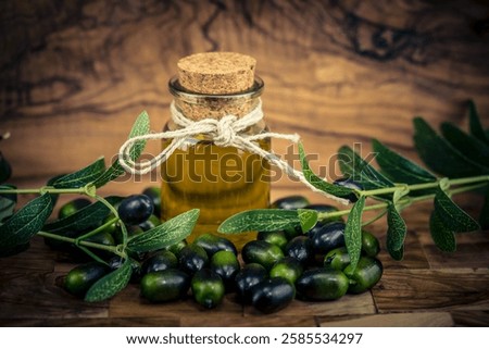 cold pressed extra virgin olive oil on olive wood