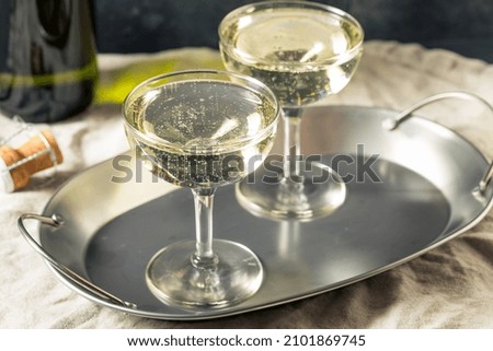 Cold Refreshing Bubbly Champagne in a Coupe Glass for New Years