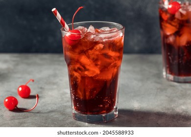 Cold Refreshing Cherry Cola in a Glass with Ice - Shutterstock ID 2045588933
