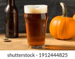 Cold Refreshing Pumpkin Ale Beer in a Pint Glass