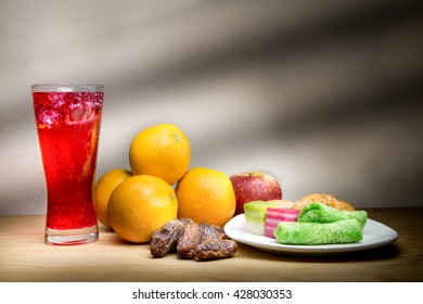 Cold Refreshing Syrup Drinks, Sweet Dates, Kuih Are Simple And Common Iftar Break Fast Food During Fasting Month Of Ramadan. Fine Art Rendition.