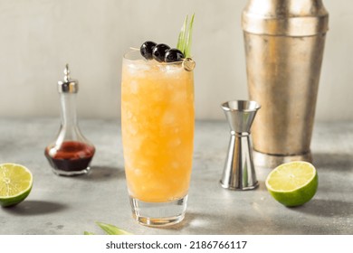 Cold Refreshing Three Dots and a Dash Cocktail with Rum and Pineapple