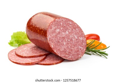 Cold Salami with slices, herbs and tomatoes, isolated on a white background. Close-up.