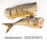 Cold smoked chopped fish on a white plate