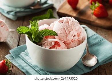 Cold Strawberry Ice Cream In A Bowl With Mint