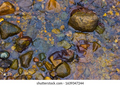 A Cold Stream Between the Rocks