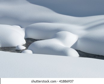 Cold winter scene with snow and water - Powered by Shutterstock