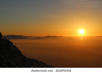 Cold Winter Sunset Above The Salt Lake Valley Inversion Smog. 