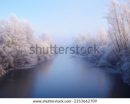 Cold Wintery Scene, Frozen River, dream like, water colour like, misty, frozen trees, golden hour 