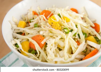 Cole Slaw With Green Onions, Carrots And Mango Pieces