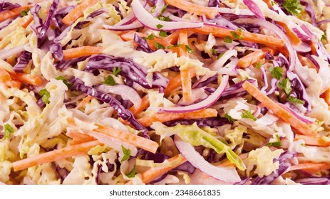 Coleslaw is a salad of chopped raw cabbage, carrots, onions mix with mayonnaise. - Powered by Shutterstock