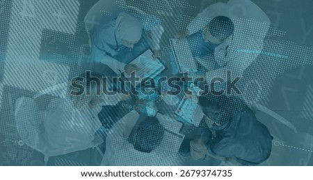 Collaborating five professionals reviewing data overlays in hospital room with laptops tablets. Teamwork, data, analytics, innovation, corporate, digital, communication