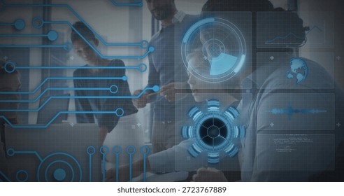 Collaborating five tech pros wearing blazers reviewing laptop with holographic UI in modern office. Teamwork, technology, interfaces, hologram, globe, radar, circuits