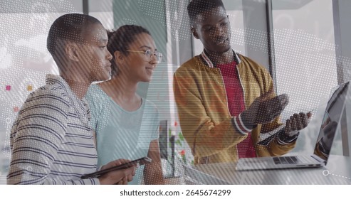 Collaborating three professionals sharing ideas in bright office, with laptop, tablet, smartphone. Collaboration, teamwork, innovation, modernity, focus, technology, productivity