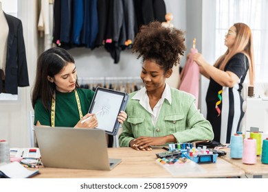 Collaboration and creativity in fashion design of teamwork, three diverse and talented designer collaborating on fabric swatches and design choices, creative studio, textile industry, fabric selection - Powered by Shutterstock