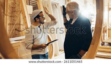 Collaboration, high five and tablet with carpenter men in workshop for manufacturing or production. Carpentry, success and teamwork with woodworking people in factory together for celebration