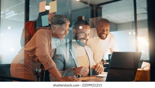 Collaboration, success and a business team cheering together in their office while working on a laptop. Computer, teamwork and celebration with a man and woman employee group saying yes or wow - Shutterstock ID 2259921211