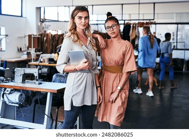 Collaboration, tablet and women in workshop, fashion designer and ready for competition in New York. Process, busy and equipment with material, boutique and small business for tailor in factory - Powered by Shutterstock