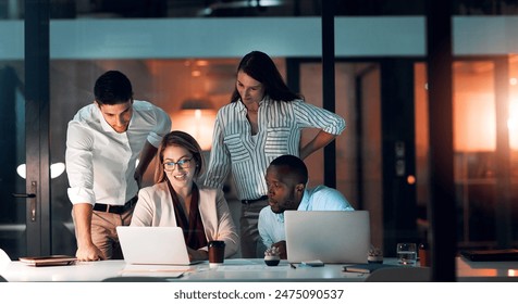 Collaboration, team diversity and office at night for deadline, strategy and explanation with laptop. Female leader, group and workshop for learning, growth and development in workplace in evening - Powered by Shutterstock