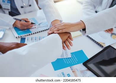 Collaboration, Team And Hands Of Doctor In Meeting Working On Research For Medical Study Or Surgery. Teamwork, Support And Partnership For Group Of Hospital Healthcare Worker With Medicine Documents