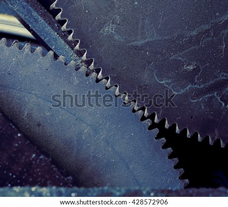 Collaboration of two gear wheels macro.