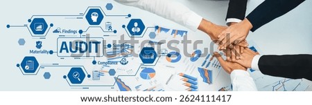 Collaborative Audit Session with Hands Close Together Over Financial Reports and Graphs Representing Compliance, Materiality, and Samples in Modern Office Setting. Amity