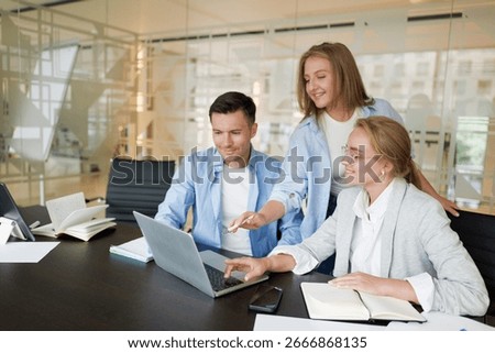 Collaborative brainstorming in a modern office setting with colleagues engaged and exchanging ideas