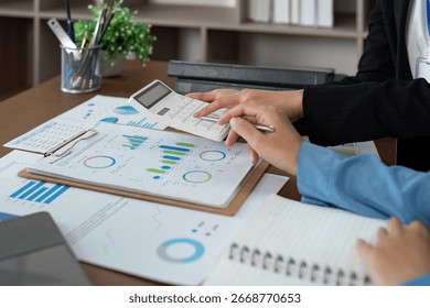 Collaborative financial planning session with advisor in office