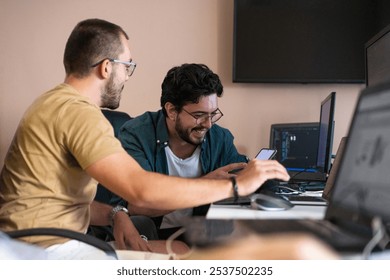 Collaborative Minds: A Team of Programmers Tackling Challenges Together in the Office.