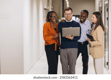 Collaborative professionals brainstorming, utilizing digital tools while engaging in teamwork within contemporary office environment