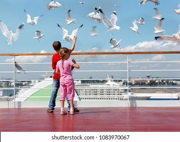 Collage With Boy In Red T-shirt And His Younger Sister Feed Seaguls On Deck Of Ship