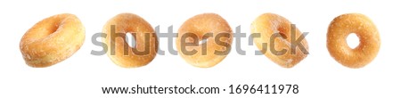 Collage with delicious donuts on white background