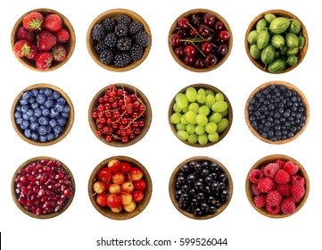 Collage Of Different Fruits And Berries Isolated On White. Blueberries, Cherries, Blackberries, Grapes, Strawberries, Currants And Pomegranate. Collection Of Fruits And Berries In A Bowl. Top View.