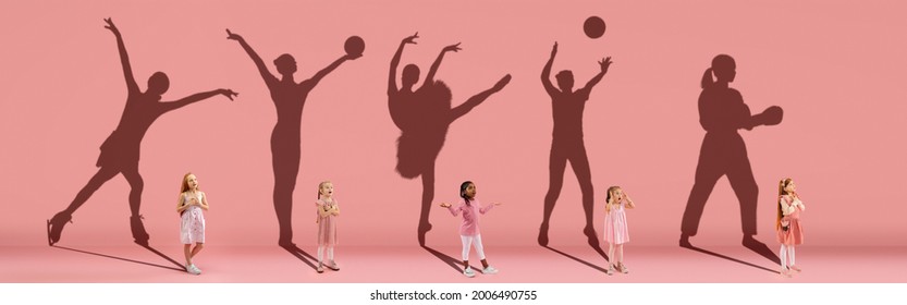 Collage. Dreams about big and famous future. Conceptual image with little girls and shadows of fit professional sportsmen on light pink, coral background. Dreams, imagination, education concept. - Shutterstock ID 2006490755