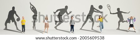 Collage. Dreams about big and famous future. Conceptual image with little boys and girls and shadows of professional sportsmen on gray background. Childhood, dreams, imagination, education concept.